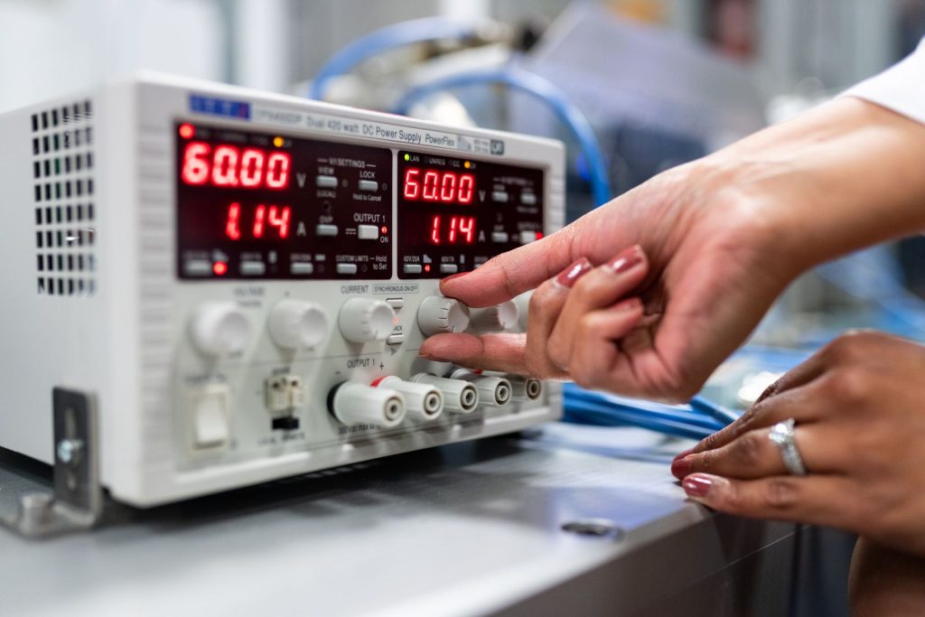 Preventive maintenance – technician checking laboratory instrument